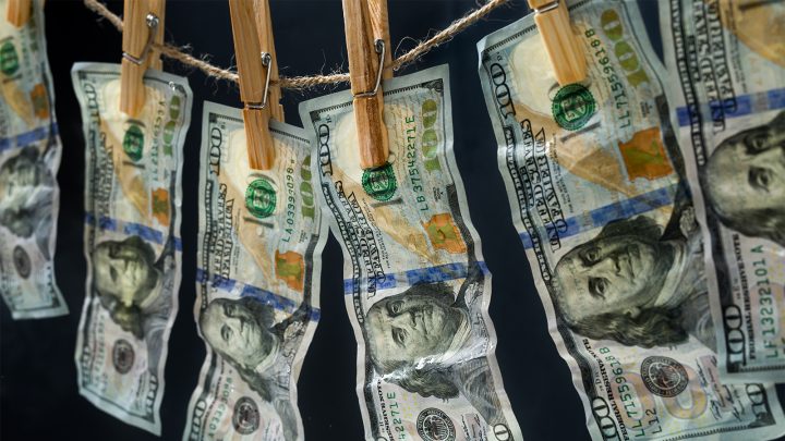 Laundered dollars hanging on a rope